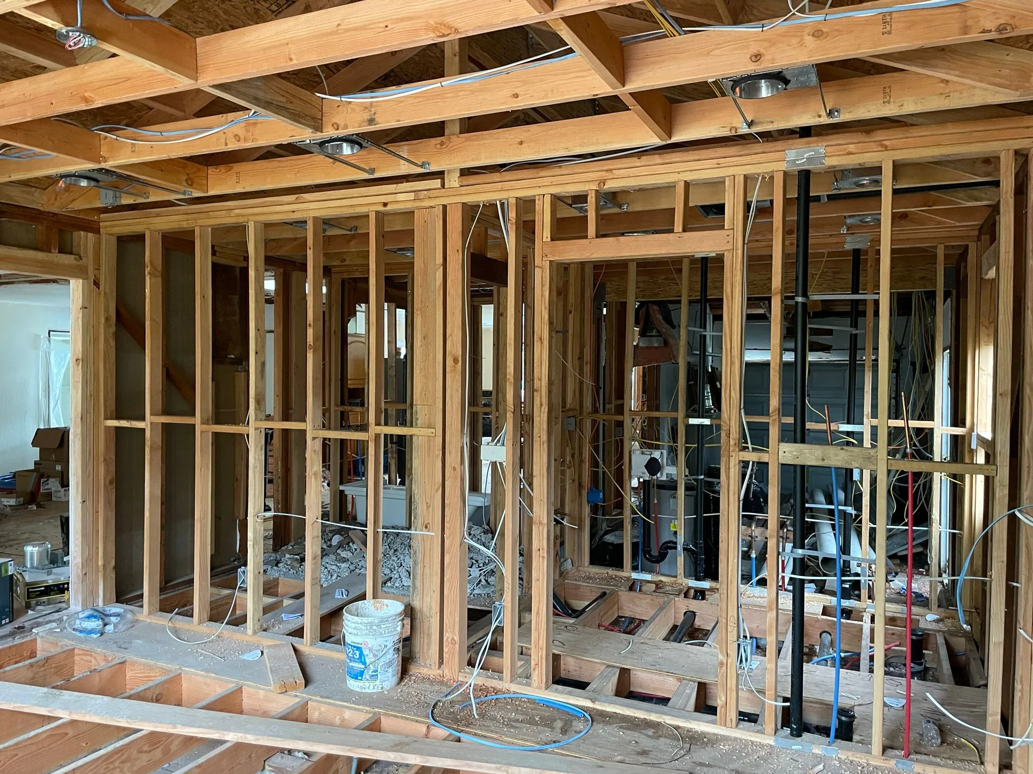 Home addition framed to structural studs, mid-construction